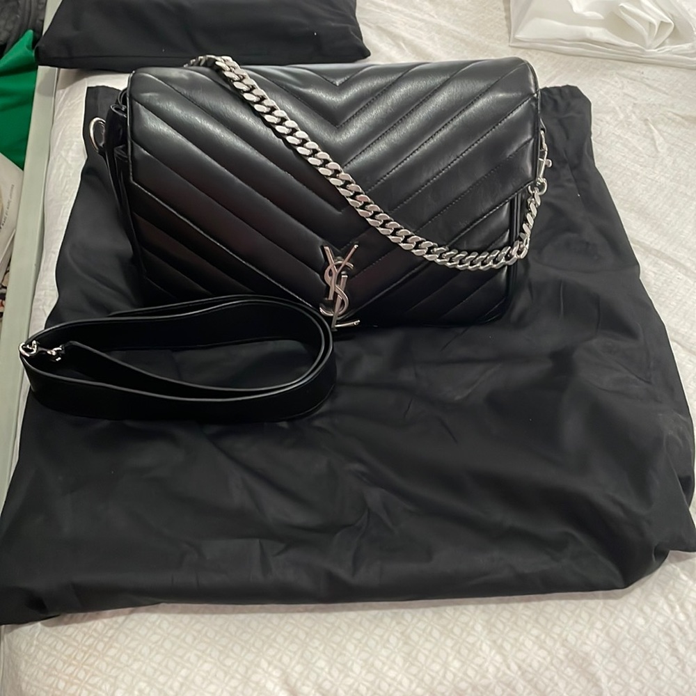 Saint Laurent shoulder bag comes with extra strip can carry as cross body.